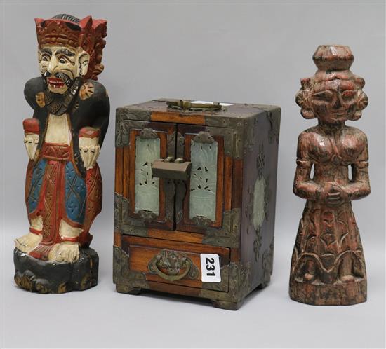 A Chinese hardwood cabinet, a Balinese figure and another figure 31cm